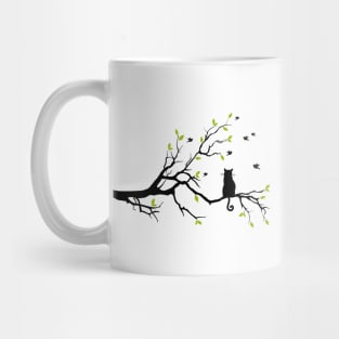 Cat sitting on tree branch Mug